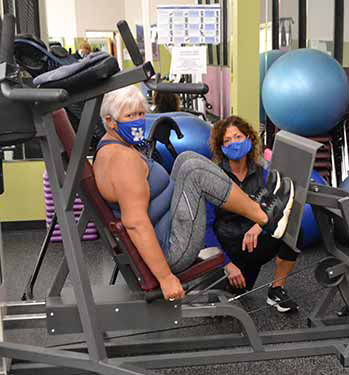Personal trainer at Fit-Time for Women working with a woman in Frankfort, KY